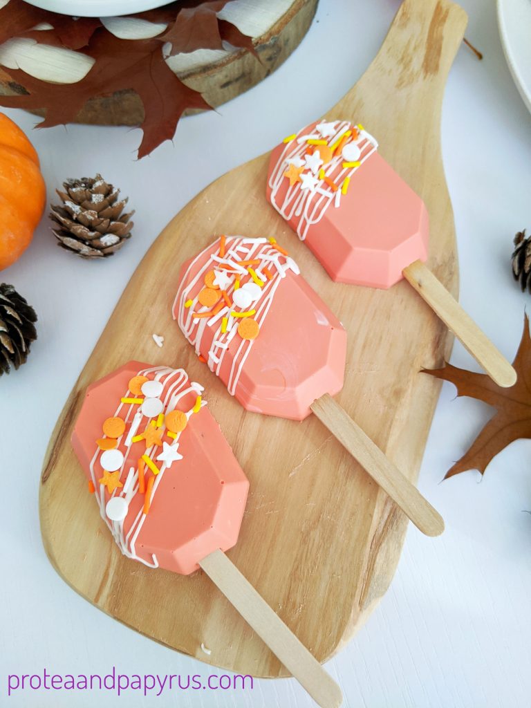 Vanilla caksicles on a wooden board